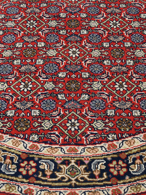Vaari Round Hand-knotted Wool Persian Rug - Red