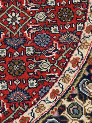 Vaari Round Hand-knotted Wool Persian Rug - Red