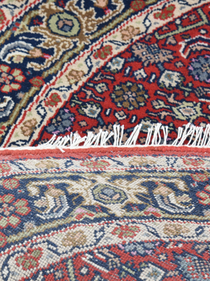 Vaari Round Hand-knotted Wool Persian Rug - Red