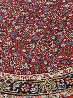 Vaari Round Hand-knotted Wool Persian Rug - Red